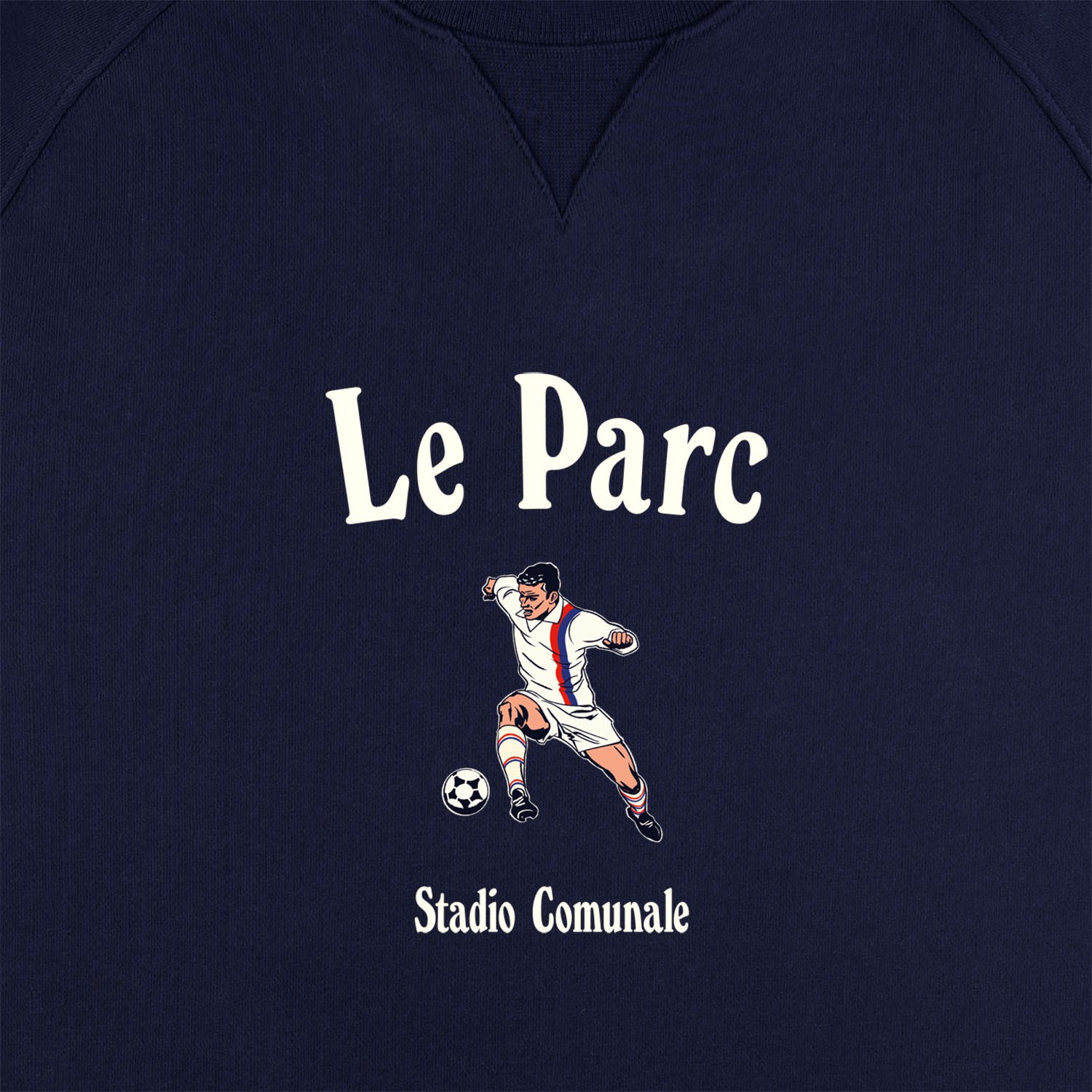 Le Parc in white on navy sweatshirt for PSG Football team.