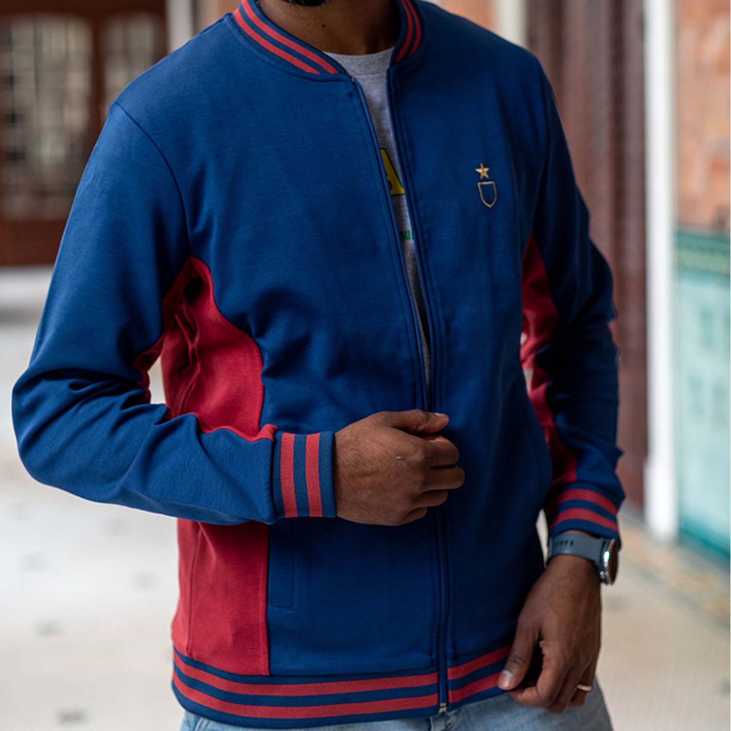 Track jacket in dark blue and garnet for Barcelona football team.